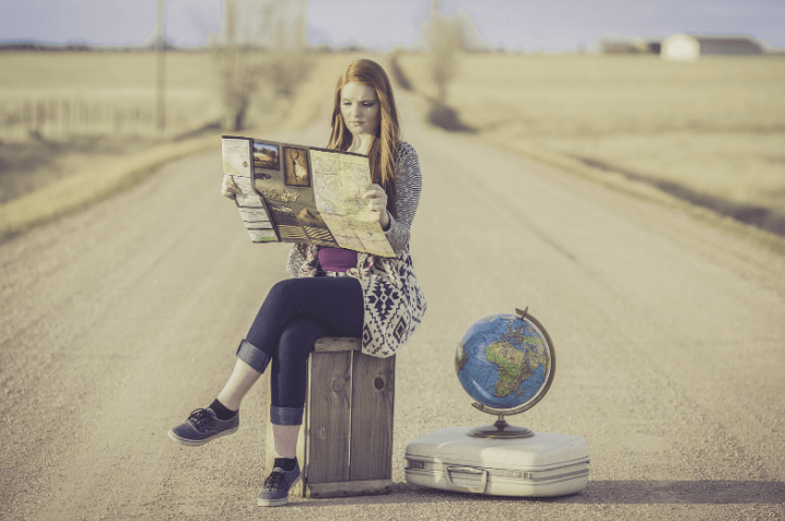 Girl reading a map